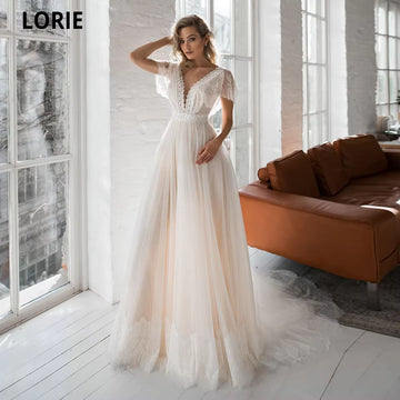 Cap Sleeve Boho Wedding Dresses Lace Appliques Champagne Dot Tulle Bride Gowns V-Neck Backless Beach Wedding Party Gowns
